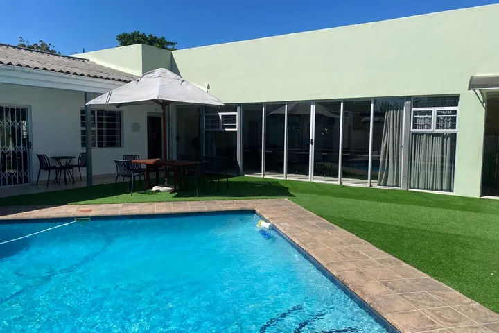 Outdoor seating and garden area at Fusion House